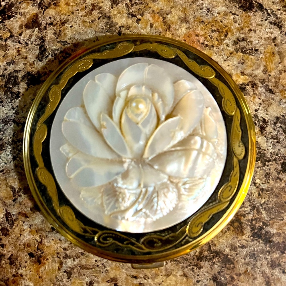 Mother of pearl compact mirror.